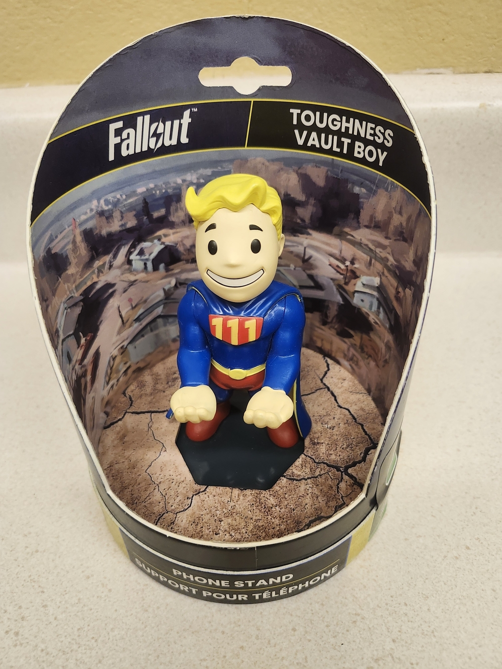 Fallout Vault Boy Toughness Phone Stand - Blue & Yellow